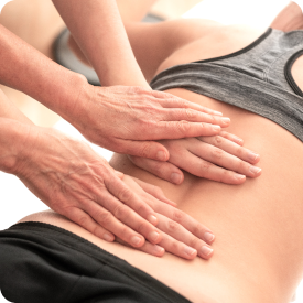 massage therapist performing a wellness service