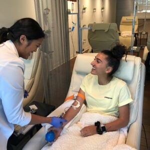 Woman getting IV Drip Therapy